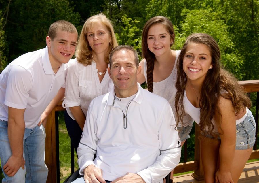 The Schlesinger family (top left to right) Michael, Lisa, Jenna, Megan, and (center) David. 