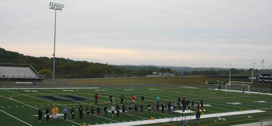 The Marching band takes advantage of the new turf field, Legacy Field. 