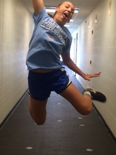 Soccer star Casey Ballow jumps for joy.