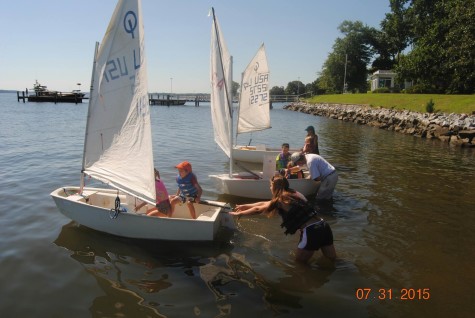 Maddie Mulligan coaching a racing fleet in Florida over the summer.