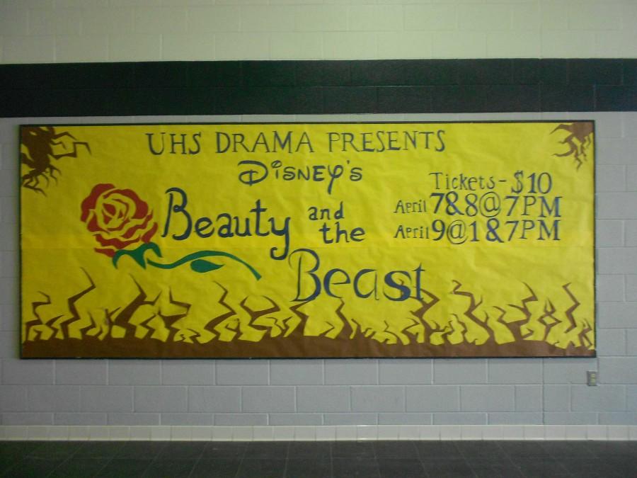 The Beauty and the Beast informative mural hangs in the auditorium prior to the shows opening night on April 7. 