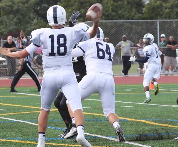 Carbaugh slings out a pass to his wide receiver VS Milford Mill.