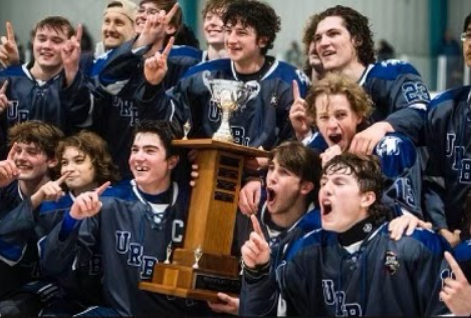 Urbana varsity ice hockey with the MVHL Cup