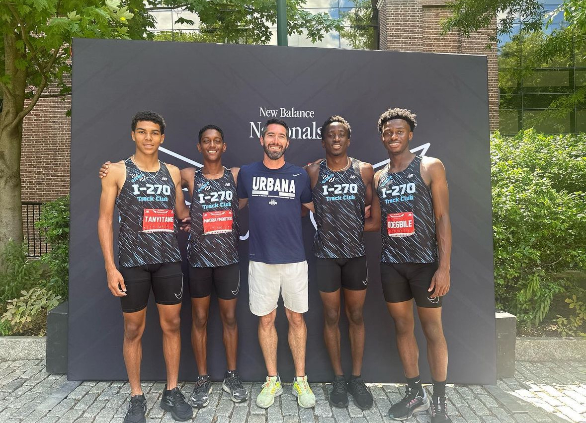 Coach Grimm's 4x100 team qualified for new balance nationals and took a group photo at the franklin field in Philadelphia.