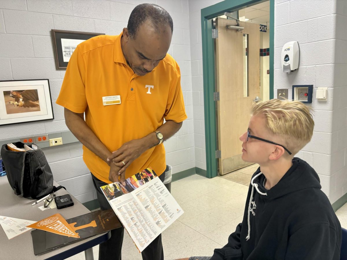 University of Tennessee recruiter, Jeffery Smith (Left) explores opportunities at the University of Tennessee, Knoxville with senior Caden Guyette (Right).