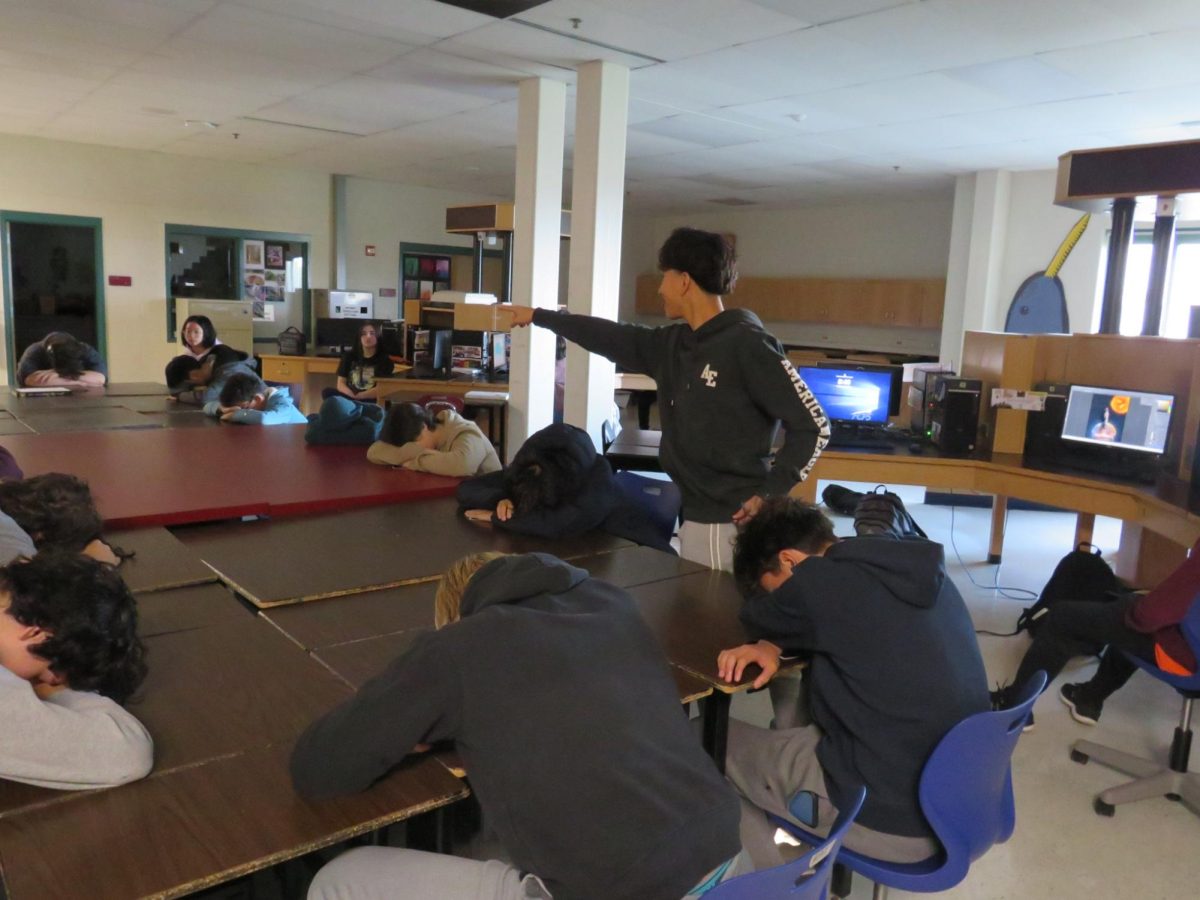 Student Gianpierre Begazo plays the role of Werewolf in Mrs. Robinson's computer graphics class to kick off  Thanksgiving Break with fun! 