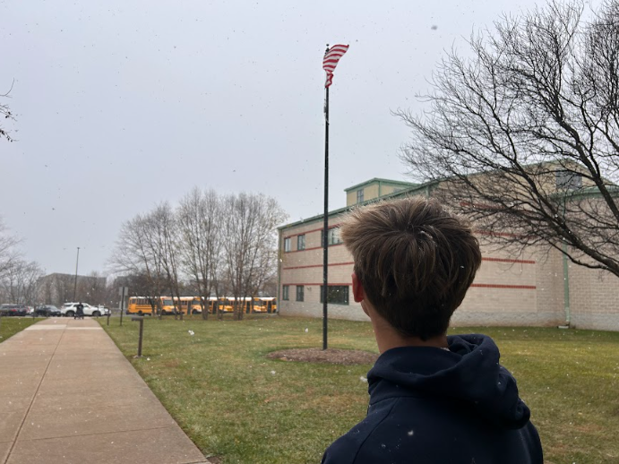 William McLeod gets into the winter spirit by admiring the flurry of snow!