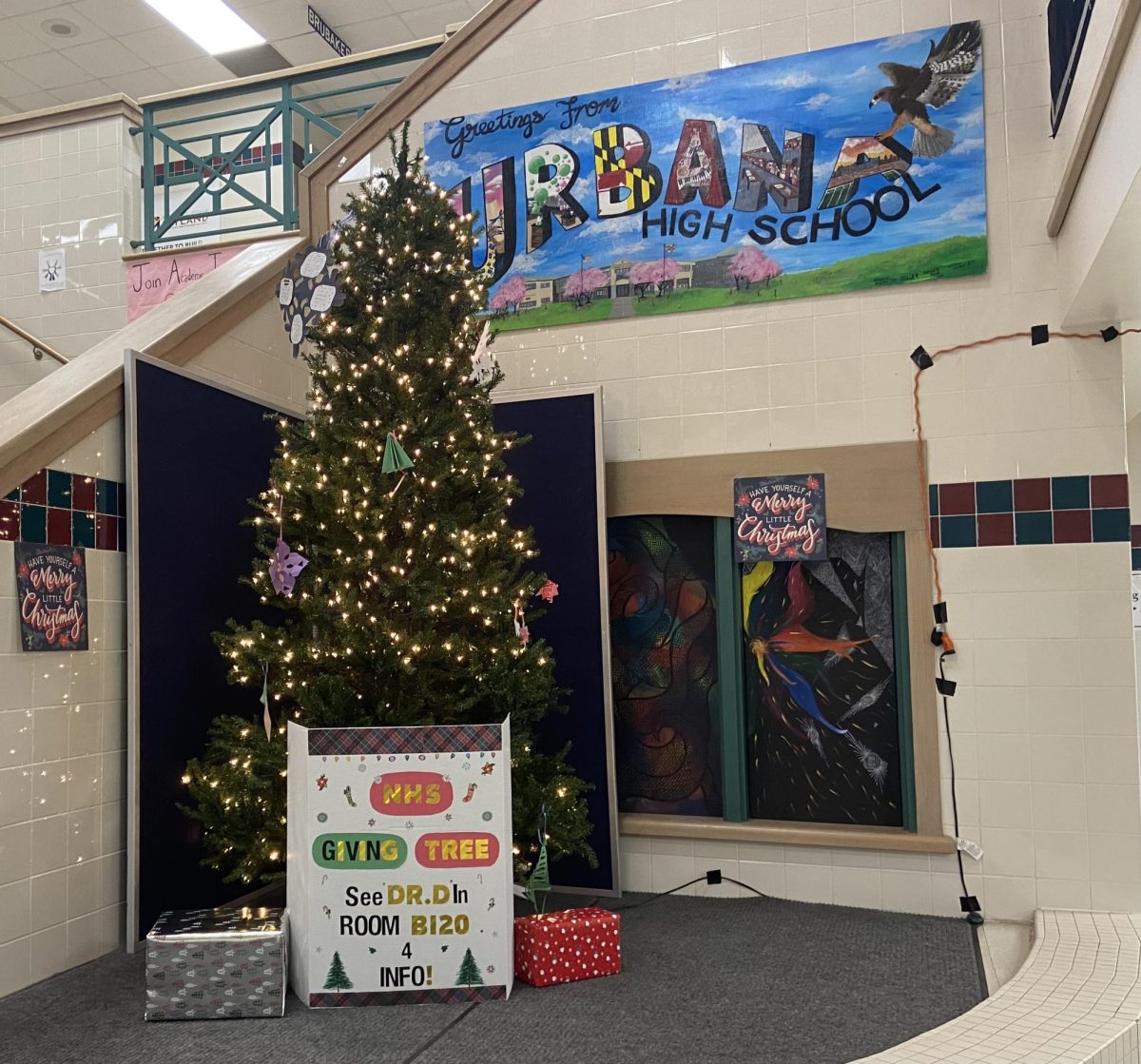 The Christmas Tree decorated with ornaments next to the main stairwell represents the drive for needy children. 