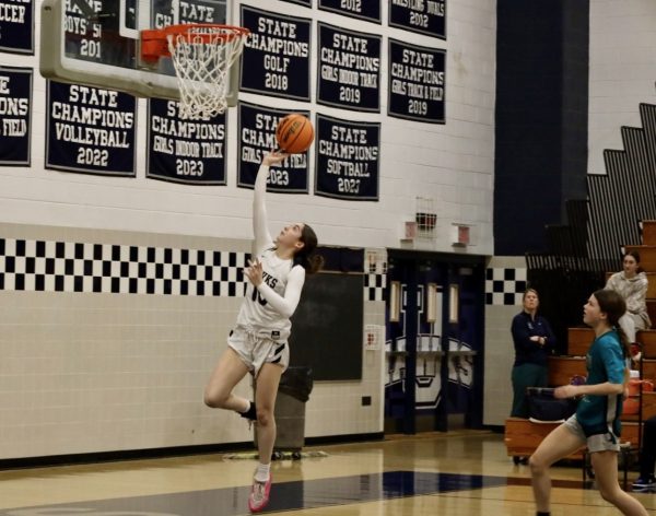 Dalia Saied, Class of 2027, goes up to finish a fast break layup to extend the JV Hawks lead en route to a 49-30 victory against Patterson Mill.