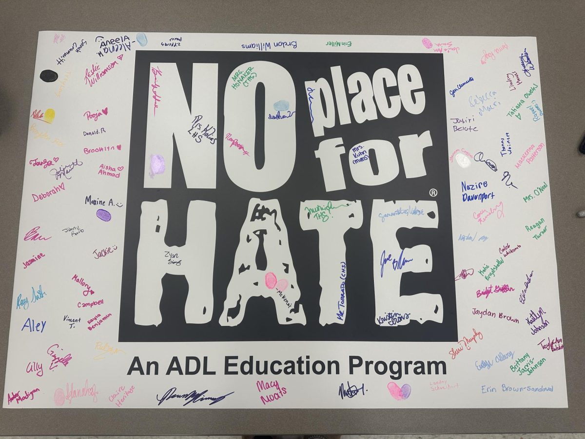 A "No Place for Hate" sign was signed by all who attended the summit as a promise to keep FCPS inclusive. 