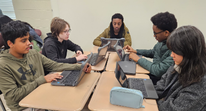 Ms. Sarah Yoder's English classroom is typical at UHS featuring students Jathon Chen, Prathyay Anumarlapudi, Will Hussong, Eyobed Hbtzghi, James Blake Shaw and Paya Hung.