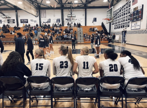 Focused and ready. The starting five sit together on the bench, mentally preparing for the game ahead, united in their goal to give it their all on the court.

From left to right: Eden Colo, Ella Crawmer, Mackenna Patterson, Kiersten Smith, Tobi Adebambo