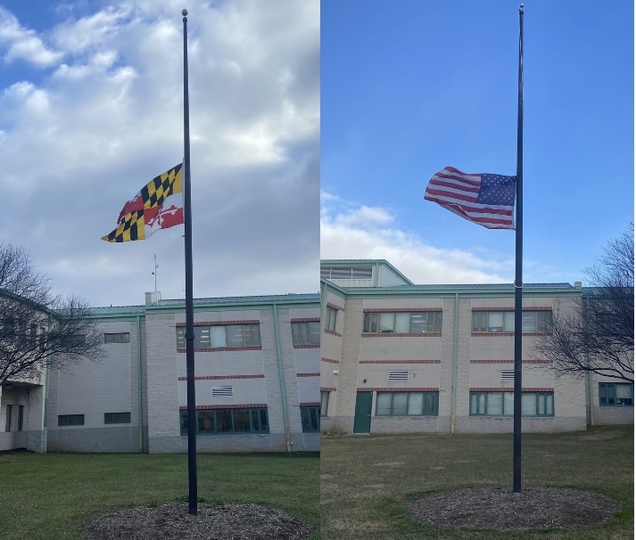 Flags brought halfway up at Urbana High in honor of Jimmy Carter after his passing at 100 years old. 