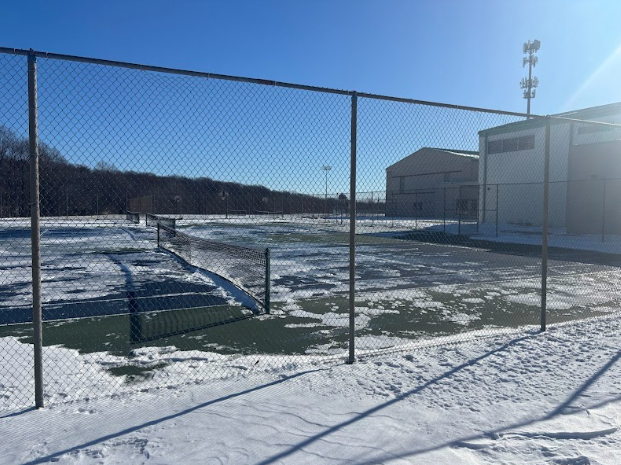 Snow and ice lay on the tennis courts, as physical education classes along with many sports are limited in what they can do.