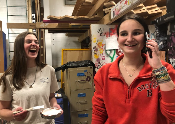 Alison Hoffacker (Class of 2026) (left), who ended up winning the grand prize for Crew Olympics this year, laughing at Felicia Assurian (Class of 2026) (right) receives a call from her mom in the middle of the competition.