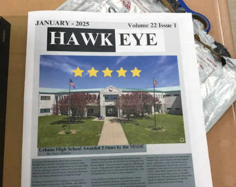 The cover photo for the physical newspaper, with an article about the Maryland State Department of Education awarding UHS the title of a five star school.