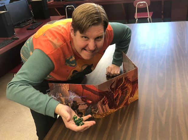 Mr. Travis Zimmerman shows off some of his dice for Dungeons and Dragons.