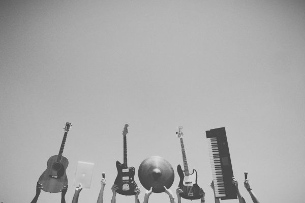Black and white image of multiple instruments. Photo by Snapwire via Pexels.