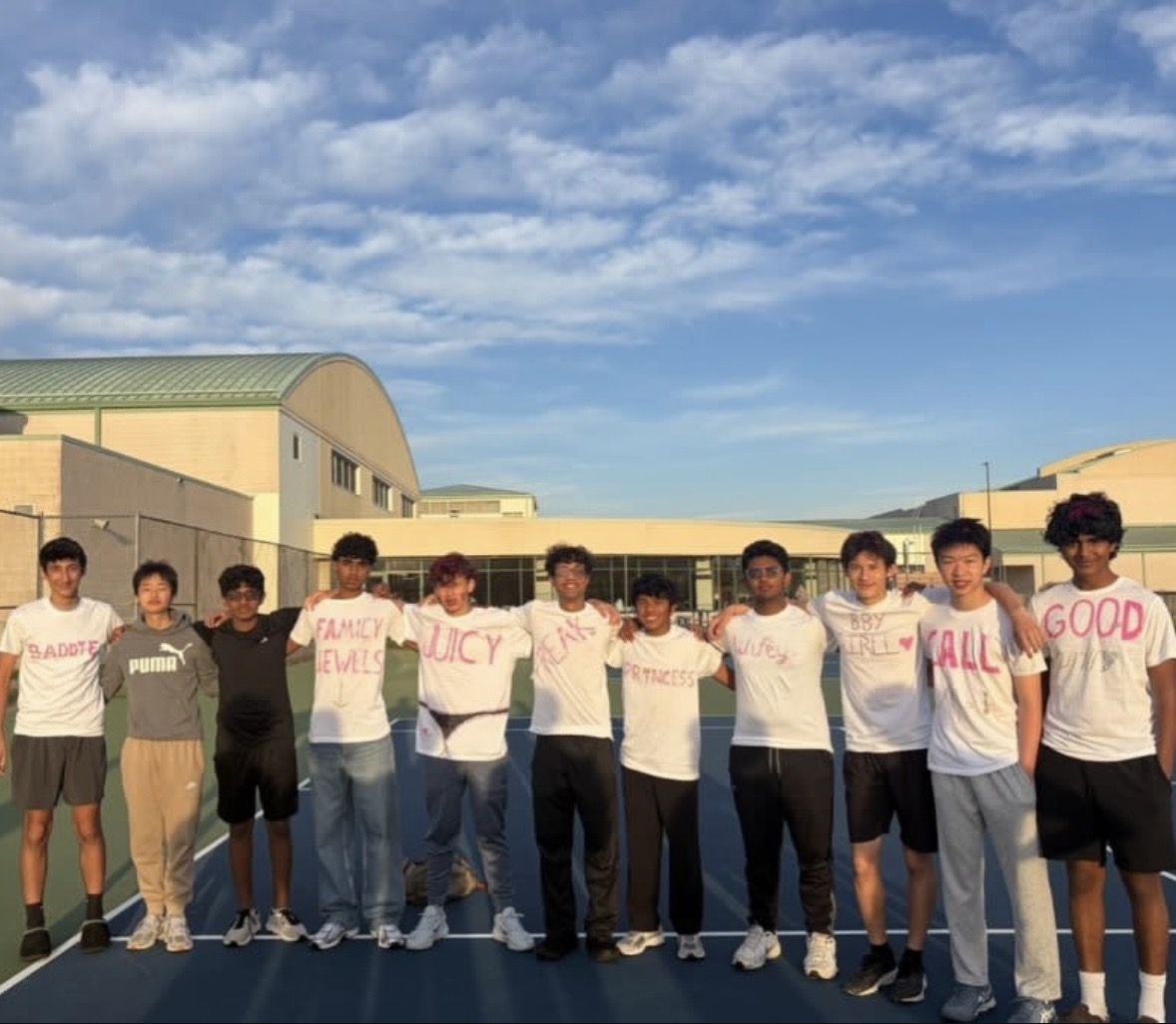 Nithin (far right) celebrates his teammates senior night with fun outfits.