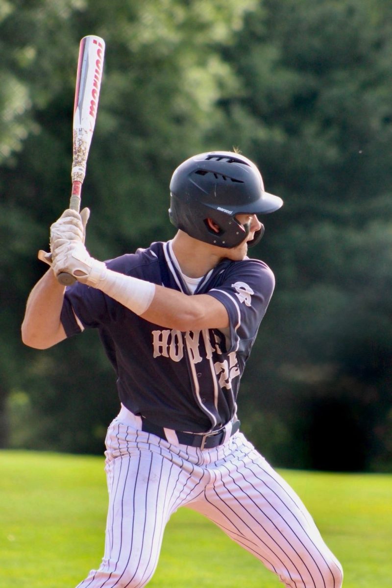 Philip takes the at bat in the IAC championship against St. Albans.